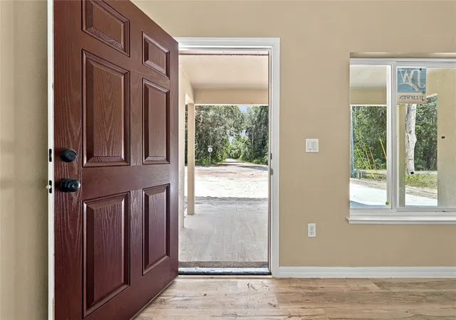 Photo 3 of Single family home for sale at 8 Sequoia Dr Crse, Ocklawaha, FL 32179 | MLS# GC541847 | Listing updated on 2026-10-07