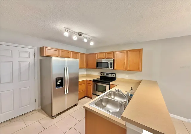 Photo 3 of Townhouse for sale at 609 Cresting Oak Cir #98, Orlando, FL 32824 | MLS# S5153423 | Listing updated on 2026-08-10