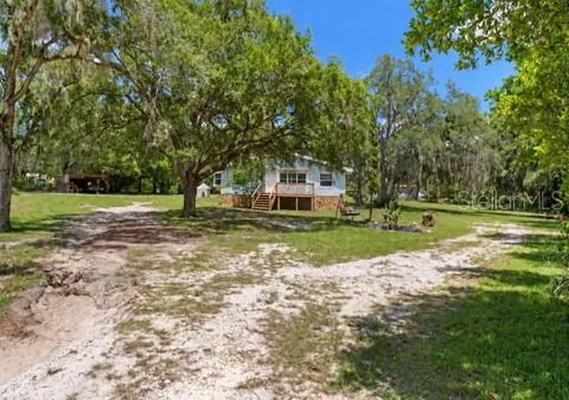 Photo 3 of Manufactured home for sale at 12042 Kamback Dr, Brooksville, FL 34614 | MLS# L4963409 | Listing updated on 2026-10-02