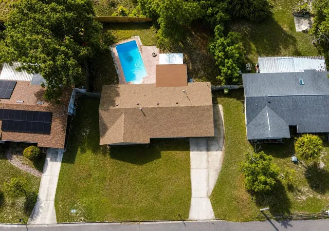 Photo 3 of Single family home for sale at 5820 Harrington Dr, Orlando, FL 32808 | MLS# S5153445 | Listing updated on 2026-08-22