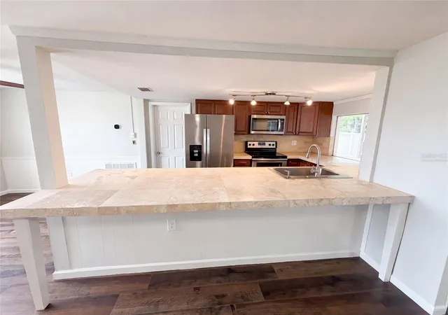 Photo 2 of Single family home for sale at 3400 Bainbridge Dr, Holiday, FL 34691 | MLS# O6424059 | Listing updated on 2026-09-19