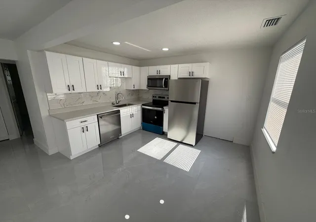 Photo 3 of Multi family home for sale at 427 40th Avenue S, Saint Petersburg, FL 33705 | MLS# TB8528017 | Listing updated on 2026-10-22