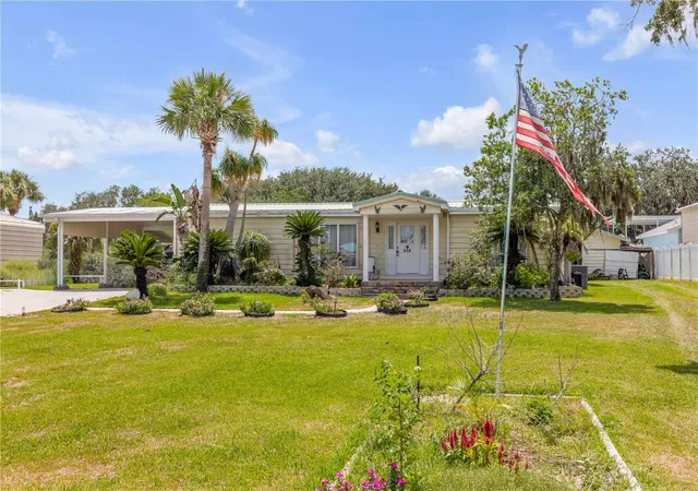 Photo 2 of Manufactured home for sale at 215 Gary Ave, Oak Hill, FL 32759 | MLS# NS1088703 | Listing updated on 2026-10-01