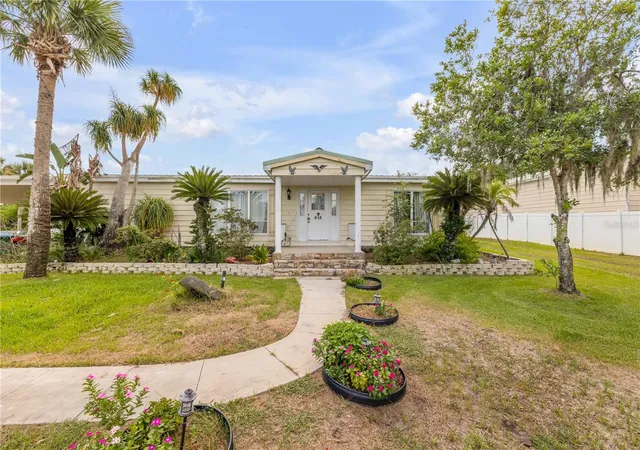 Photo 3 of Manufactured home for sale at 215 Gary Ave, Oak Hill, FL 32759 | MLS# NS1088703 | Listing updated on 2026-10-01