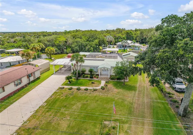 Photo 3 of Manufactured home for sale at 215 Gary Ave, Oak Hill, FL 32759 | MLS# NS1088703 | Listing updated on 2026-10-01