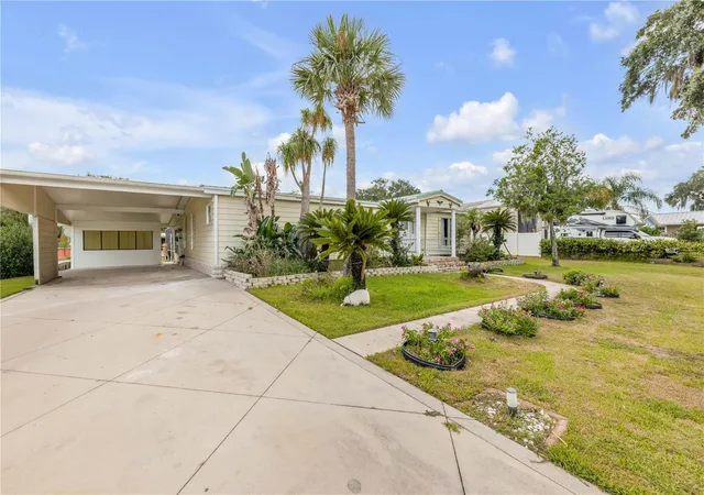Photo 4 of Manufactured home for sale at 215 Gary Ave, Oak Hill, FL 32759 | MLS# NS1088703 | Listing updated on 2026-10-01