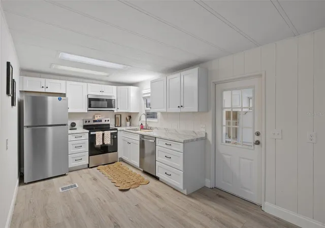 Photo 3 of Manufactured home for sale at 3450 Osage Dr, Zephyrhills, FL 33541 | MLS# W7887546 | Listing updated on 2026-10-07