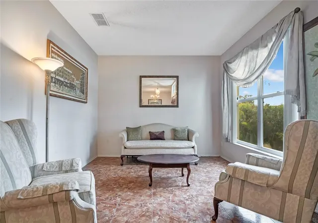 Photo 3 of Single family home for sale at 1019 Bridgeway Blvd, Orlando, FL 32828 | MLS# O6424201 | Listing updated on 2026-09-21