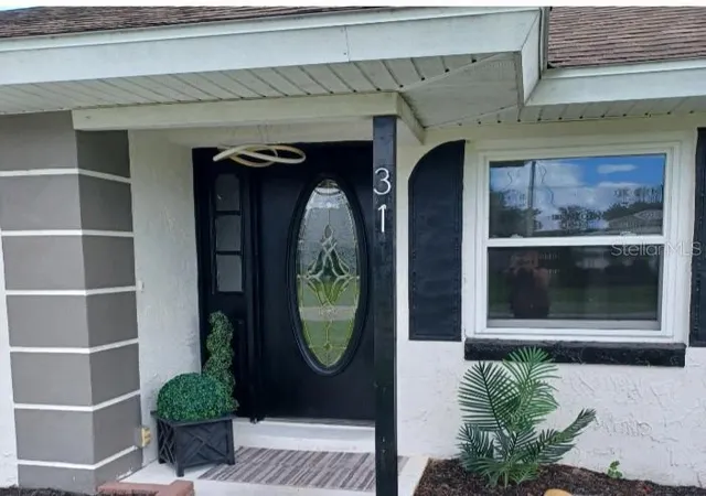 Photo 2 of Single family home for sale at 31 Freeland Ln, Palm Coast, FL 32137 | MLS# TB8528131 | Listing updated on 2026-08-11