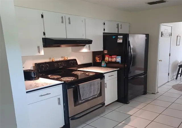 Photo 4 of Single family home for sale at 31 Freeland Ln, Palm Coast, FL 32137 | MLS# TB8528131 | Listing updated on 2026-08-11