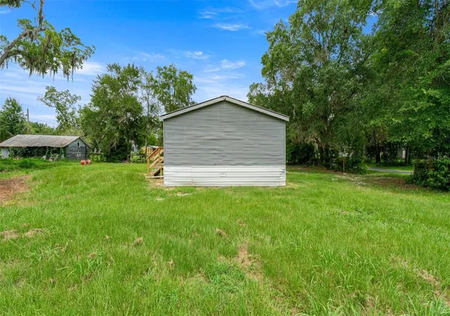 Photo 2 of Manufactured home for sale at 5363 Orange St, Hampton, FL 32044 | MLS# OM728292 | Listing updated on 2026-08-11