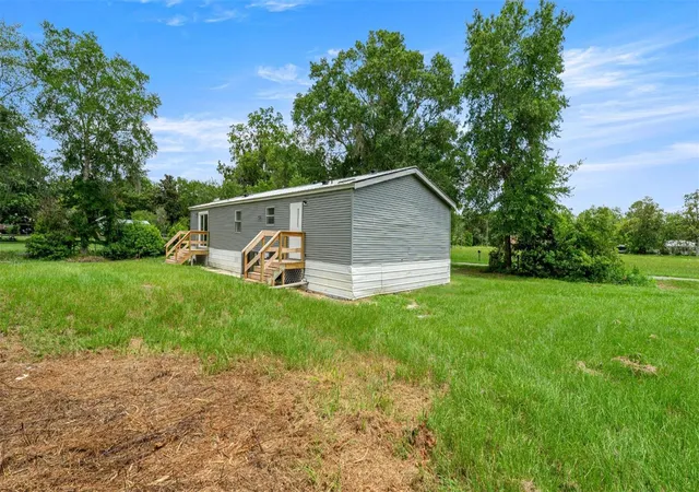 Photo 3 of Manufactured home for sale at 5363 Orange St, Hampton, FL 32044 | MLS# OM728292 | Listing updated on 2026-08-11