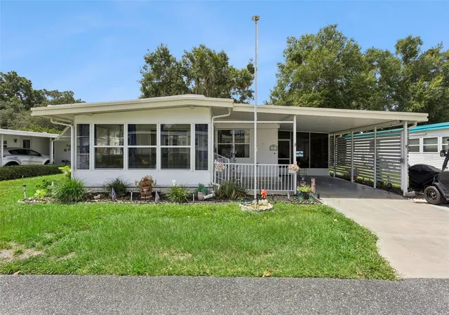 Photo 1 of Manufactured home for sale at 104 Oleander Cvs, Leesburg, FL 34748 | MLS# G5114927 | Listing updated on 2026-08-08