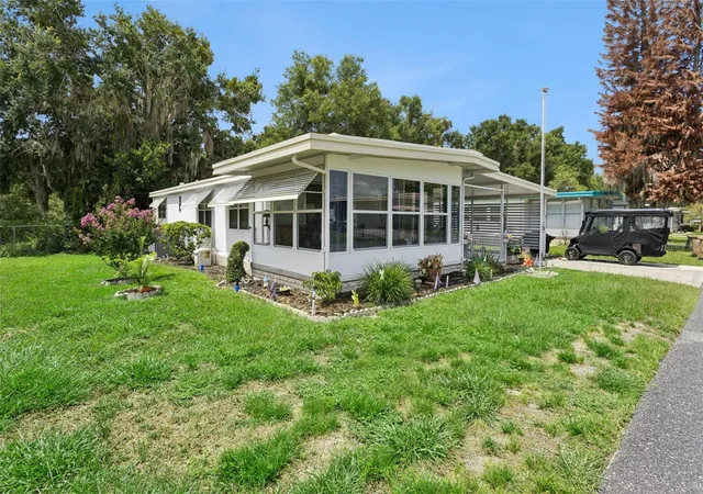 Photo 3 of Manufactured home for sale at 104 Oleander Cvs, Leesburg, FL 34748 | MLS# G5114927 | Listing updated on 2026-08-08