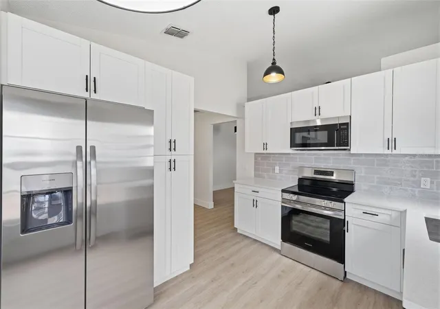 5th image of 7705 Balharbour Dr, New Port Richey, FL 34653 | MLS# TB8528265