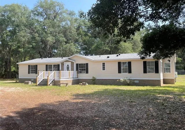 1st image of 30349 Elam Rd, Wesley Chapel, FL 33545 | MLS# GC541886