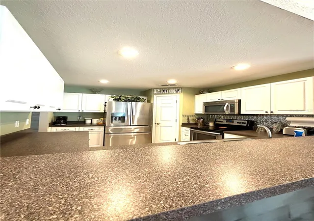 3rd image of 902 E Tomlin St, Plant City, FL 33563 | MLS# TB8528280