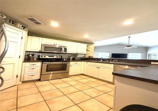 4th image of 902 E Tomlin St, Plant City, FL 33563 | MLS# TB8528280