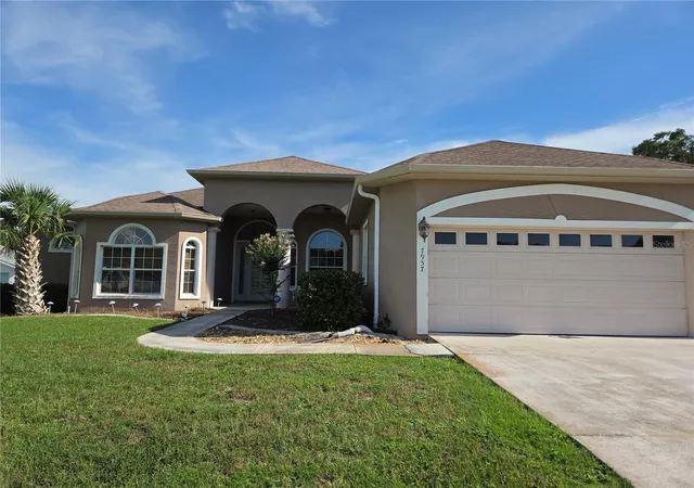 Photo 2 of Single family home for sale at 7957 Sw 103rd Loop, Ocala, FL 34476 | MLS# OM728307 | Listing updated on 2026-07-23