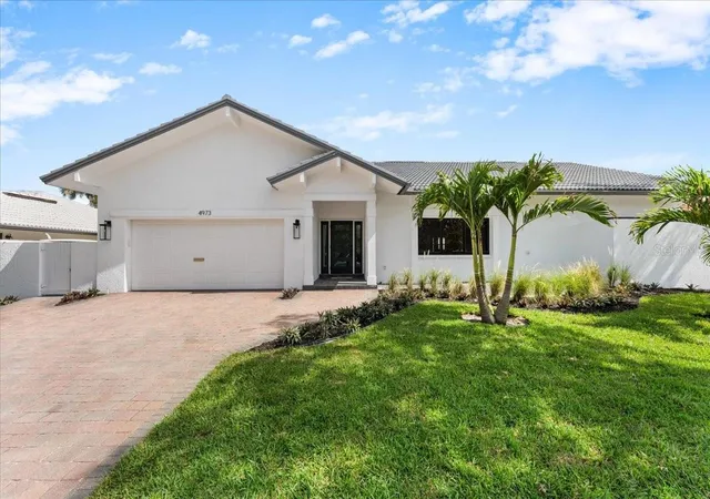 Single family home for sale at 4973 60th Avenue S, Saint Petersburg, FL 33715 | MLS# TB8528306
