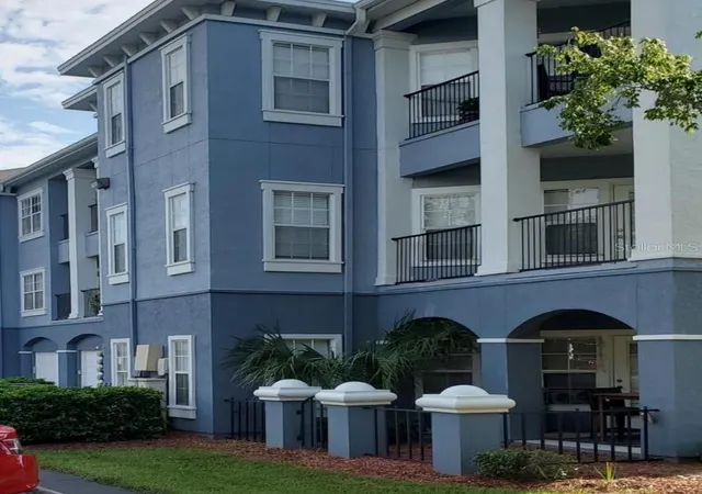 Listing Photo 1 - Condo for sale in building located at 3621 Conroy Rd, Orlando, FL 32839 - Unit #720