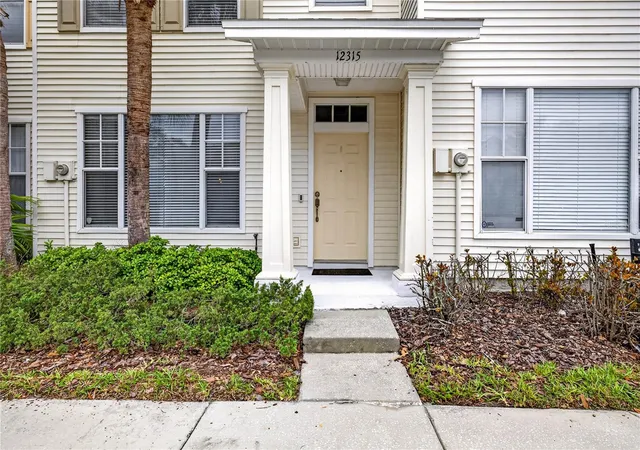 Photo 2 of Townhouse for sale at 12315 Country White Cir, Tampa, FL 33635 | MLS# TB8528400 | Listing updated on 2026-08-28