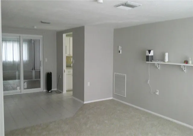 Photo 4 of Single family home for sale at 1203 Chancellor Dr, Holiday, FL 34690 | MLS# TB8528450 | Listing updated on 2026-09-04