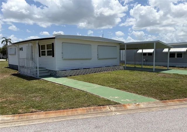 Photo 2 of Manufactured home for sale at 5304 Cherry Hl Ave, Sarasota, FL 34234 | MLS# A4699773 | Listing updated on 2026-07-13