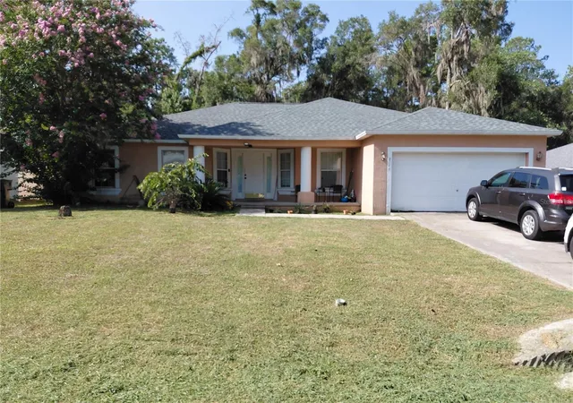 Photo 1 of Single family home for sale at 2716 Ne 24th Place, Ocala, FL 34470 | MLS# OM728343 | Listing updated on 2026-07-15