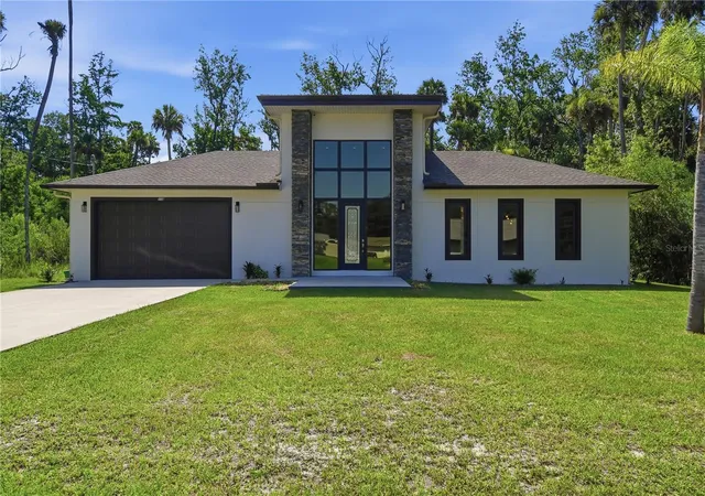 Photo 1 of Single family home for sale at 118 Blare Dr, Palm Coast, FL 32137 | MLS# FC319916 | Listing updated on 2026-09-28