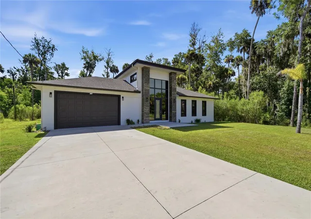 Photo 2 of Single family home for sale at 118 Blare Dr, Palm Coast, FL 32137 | MLS# FC319916 | Listing updated on 2026-09-28