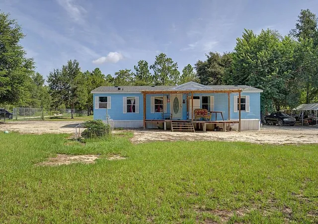 Photo 1 of Manufactured home for sale at 7491 Ne 101st Court, Bronson, FL 32621 | MLS# W7887584 | Listing updated on 2026-08-24