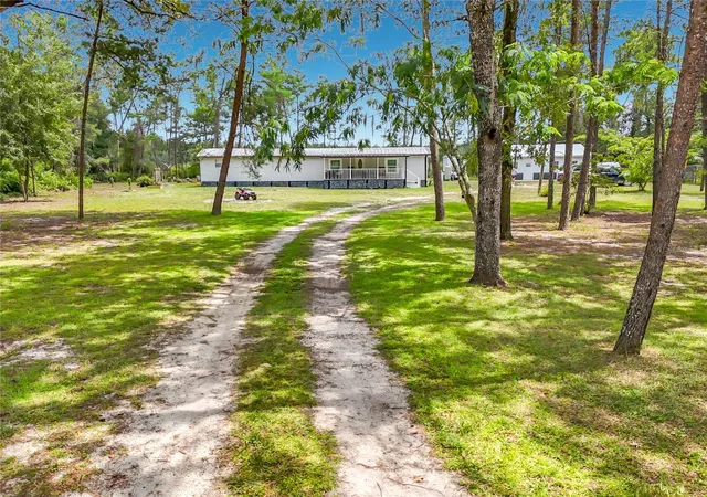 Photo 1 of Manufactured home for sale at 151 Lake Susan Rd, Hawthorne, FL 32640 | MLS# TB8528674 | Listing updated on 2026-10-05