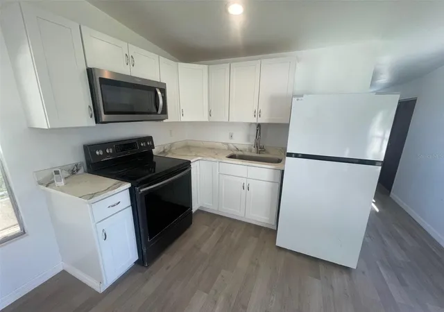 Photo 2 of Manufactured home for sale at 7489 Charlin Pkwy, Orlando, FL 32822 | MLS# O6424592 | Listing updated on 2026-07-14