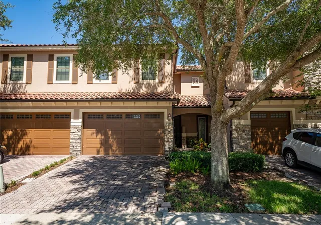 Photo 1 of Townhouse for sale at 8349 Kelsall Dr, Orlando, FL 32832 | MLS# O6424640 | Listing updated on 2026-07-14