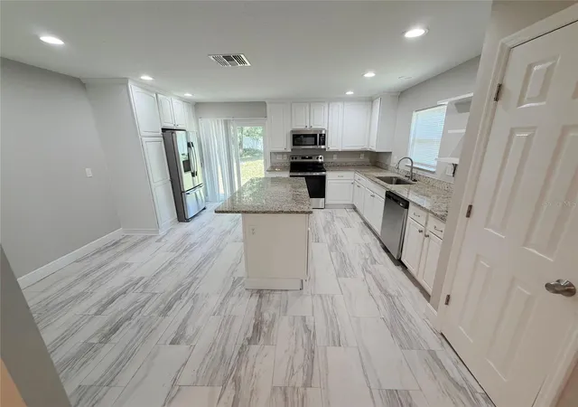 5th image of 312 Wade Ave, Deland, FL 32724 | MLS# V4950175