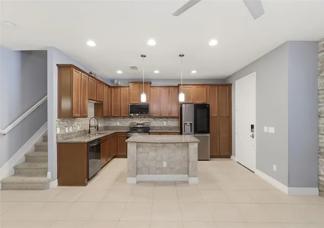 Photo 3 of Townhouse for sale at 10016 Eagle Crk Ctr Blvd, Orlando, FL 32832 | MLS# O6424699 | Listing updated on 2026-10-26