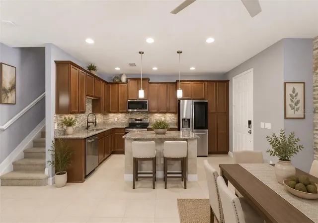 Photo 4 of Townhouse for sale at 10016 Eagle Crk Ctr Blvd, Orlando, FL 32832 | MLS# O6424699 | Listing updated on 2026-10-26