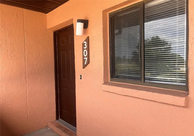 Listing Photo 2 - Condo for sale in building located at 1712 University Ln, COCOA, FL 32922 - Unit #307