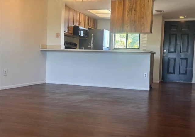 Listing Photo 5 - Condo for sale in building located at 1712 University Ln, COCOA, FL 32922 - Unit #307