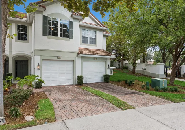 Photo 2 of Townhouse for sale at 6887 Sperone St, Orlando, FL 32819 | MLS# O6424770 | Listing updated on 2026-08-26