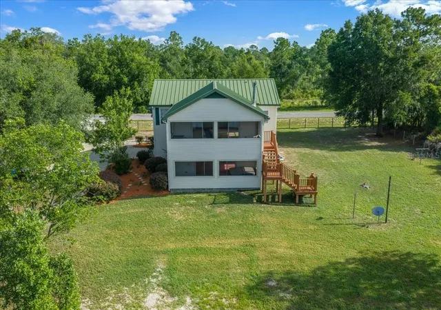 Photo 3 of Single family home for sale at 206 Malauka Radl, Ocklawaha, FL 32179 | MLS# OM728404 | Listing updated on 2026-08-07