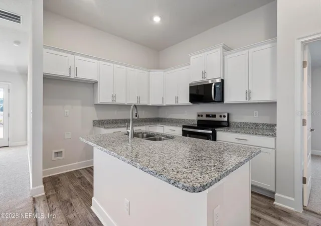 Photo 4 of Single family home for sale at 16 Beaverdam Ln, Palm Coast, FL 32137 | MLS# FC319934 | Listing updated on 2026-10-03