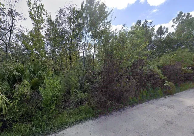 Photo 1 of Land for sale at 0 Powell St, New Port Richey, FL 34654 | MLS# W7887606 | Listing updated on 2026-07-14