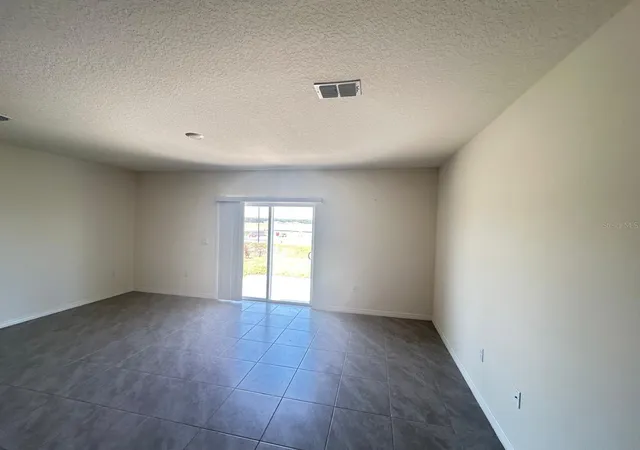 Photo 2 of Townhouse for sale at 1471 Plank Pl, DAVENPORT, FL 33837 | MLS# S5153664 | Listing updated on 2026-10-12