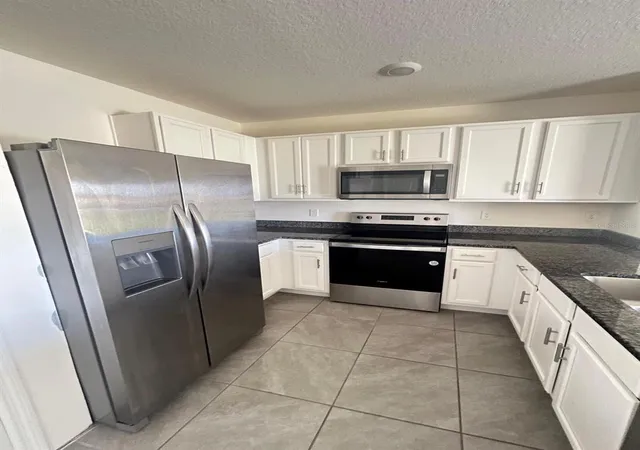 Photo 3 of Townhouse for sale at 1471 Plank Pl, Davenport, FL 33837 | MLS# S5153664 | Listing updated on 2026-10-12