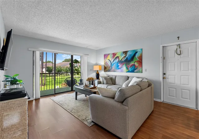 Listing Photo 2 - Condo for sale in building located at 8217 Sun Spring Cir, Orlando, FL 32825 - Unit #72