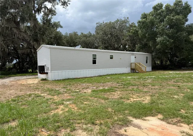 Photo 2 of Manufactured home for sale at 5642 Meadow Glen Rd, Lakeland, FL 33810 | MLS# S5153668 | Listing updated on 2026-09-24