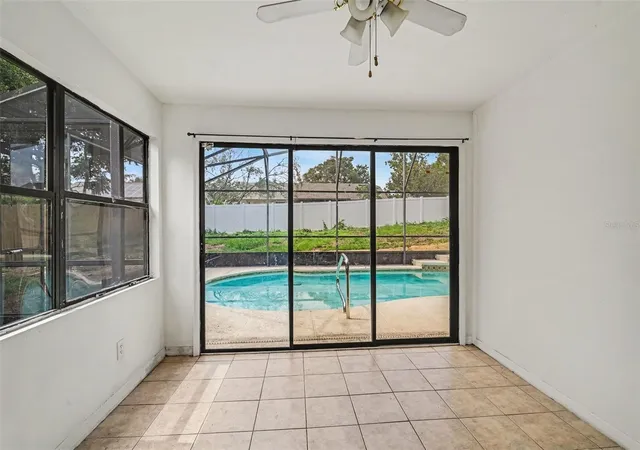 Photo 2 of Single family home for sale at 7774 Barberry Dr, Orlando, FL 32835 | MLS# TB8528974 | Listing updated on 2026-10-04