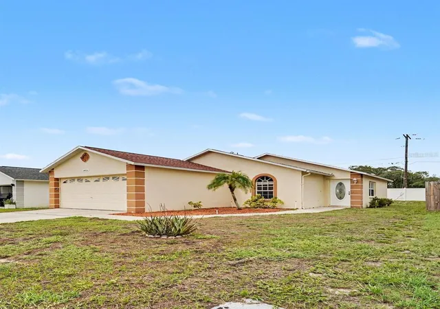 Photo 2 of Single family home for sale at 10236 Flagship Ave, Port Richey, FL 34668 | MLS# O6424891 | Listing updated on 2026-09-28
